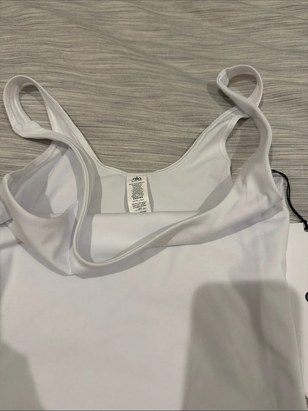 ALO Yoga White soft sculpt precision Scoop Tank with Center Logo on back